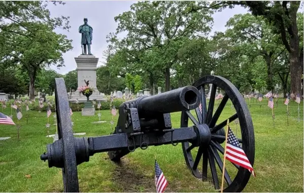 GAR monument and Civil War Cannon in cemetery